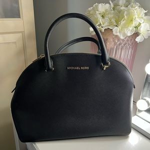 Black leather satchel. New with tags